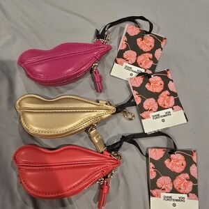Diane Von Furstenberg Lip-Shaped Pouches in Pink, Gold, and Red